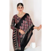 { "alt_text": "Black crepe printed saree with unstitched blouse, 5.5m, ethnic wear, Indian fashion, traditional attire" }