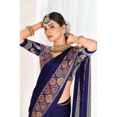 { "alt_text": "Navy blue crepe printed saree with unstitched blouse, 5.5m, ethnic wear, Indian fashion" }