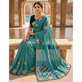 { "alt_text": "Blue georgette saree with star embellishment, 5.5 meter unstitched blouse, ethnic wear fashion" }