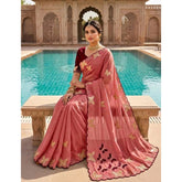 { "alt_text": "Dusty coral-maroon georgette saree with star embellishment, unstitched blouse, 5.5mtr ethnic wear" }