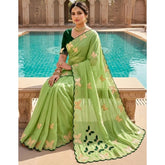 { "alt_text": "Green georgette saree with star embellishment, 5.5 meter unstitched blouse, ethnic wear for women" }