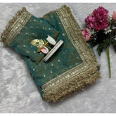 { "alt_text": "Green silk embellished saree with unstitched blouse, 5.5Mtr, traditional Indian ethnic wear" }