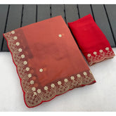 { "alt_text": "Orange georgette saree with embroidery, star print ethnic wear, unstitched blouse 5.5mtr" }