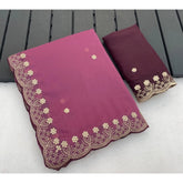 { "alt_text": "Pink georgette embroidered saree with unstitched blouse, star print ethnic wear, 5.5 meter Indian clothing" }