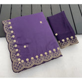 { "alt_text": "Purple georgette embroidered saree with unstitched blouse, star print ethnic wear, 5.5 meter Indian clothing" }