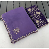 { "alt_text": "Purple georgette embroidered saree with unstitched blouse, star print ethnic wear, 5.5 meter Indian clothing" }