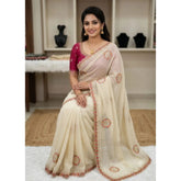 { "alt_text": "Cream georgette embroidered saree with unstitched blouse, star pattern ethnic wear, 5.5 meter Indian clothing" }