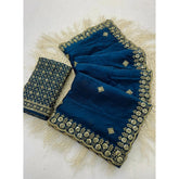 { "alt_text": "Teal satin embellished saree with unstitched blouse, 5.5Mtr, traditional Indian ethnic wear" }