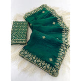{ "alt_text": "Green satin embellished saree with unstitched blouse, 5.5m, traditional Indian ethnic wear" }