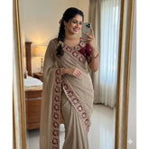 { "alt_text": "Beige georgette saree with star embroidery, unstitched blouse, 5.5Mtr ethnic wear for women" }