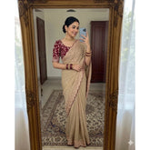 { "alt_text": "Beige georgette saree with star embroidery, unstitched blouse, 5.5Mtr ethnic wear for women" }