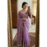 { "alt_text": "Purple georgette embroidered saree with unstitched blouse, star print ethnic wear, 5.5 meter Indian clothing" }