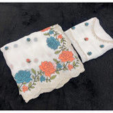 { "alt_text": "White chiffon embroidered saree with unstitched blouse, 5.5m, elegant ethnic wear for women" }