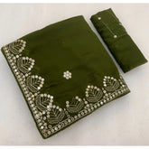 { "alt_text": "Green georgette saree with embellishment, unstitched blouse, 5.5Mtr ethnic wear for women" }