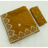 { "alt_text": "Mustard-yellow georgette saree with embellishment, unstitched blouse, 5.5m saree fabric for ethnic wear" }