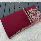 { "alt_text": "Maroon art silk saree with embroidery, unstitched blouse, 5.5mtr ethnic wear for women" }