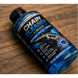 { "alt_text": "Clear liquid chain cleaner bottles, 100 ML, pack of 2, removes dirt and grease from bicycle chains" }