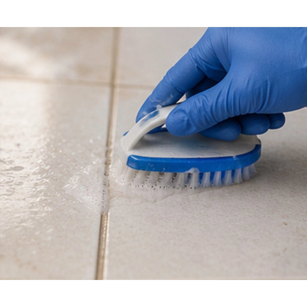 { "alt_text": "Clear liquid tile cleaner bottles, 100 ML, for removing dirt and stains from tile surfaces, fresh fruit fragrance" }