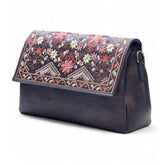 { "alt_text": "Coffee polyurethane floral embroidered crossbody sling bag, adjustable strap, women's fashion accessory" }