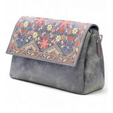 { "alt_text": "Grey polyurethane crossbody sling bag with floral embroidery, adjustable strap, women's fashion accessory" }