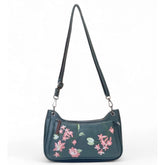 { "alt_text": "Blue polyurethane crossbody sling bag with floral embroidery, adjustable strap, women's fashion accessory" }
