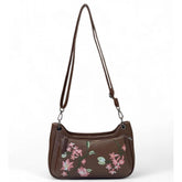 { "alt_text": "Brown polyurethane crossbody sling bag with floral embroidery, adjustable strap, women's fashion accessory" }