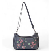 { "alt_text": "Grey polyurethane crossbody sling bag with floral embroidery, adjustable strap, women's fashion accessory" }