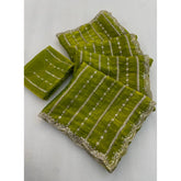{ "alt_text": "Olive green embellished saree with unstitched blouse, 5.5Mtr, Jimmy Choo ethnic wear for women" }