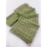 { "alt_text": "Green embellished saree with unstitched blouse, 5.5mtr, Jimmy Choo ethnic wear for wedding occasion" }