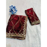 { "alt_text": "Maroon embellished saree with unstitched blouse, 5.5mtr, Jimmy Choo ethnic wear, Indian occasion outfit" }