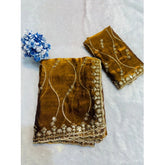 { "alt_text": "Yellow embellished saree with unstitched blouse, 5.5mtr, Jimmy Choo ethnic wear, Indian occasion wear" }
