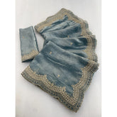 { "alt_text": "Blue satin embellished saree with unstitched blouse, 5.5 meter ethnic wear, traditional Indian fashion" }