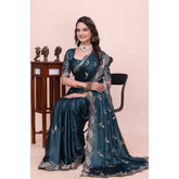 { "alt_text": "Teal georgette embroidered saree with unstitched blouse, 5.5 meter ethnic wear, Indian occasion outfit" }
