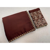 { "alt_text": "Brown chiffon embroidered saree with unstitched blouse, 5.5 meter ethnic wear, Indian occasion outfit" }