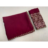 { "alt_text": "Maroon chiffon embroidered saree with unstitched blouse, 5.5 meter ethnic wear, Indian occasion outfit" }