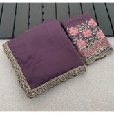 { "alt_text": "Purple georgette saree with embellishment, unstitched blouse, 5.5 meter ethnic wear for women" }