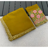 { "alt_text": "Yellow georgette saree with embellishment, unstitched blouse, 5.5 meter ethnic wear for women" }