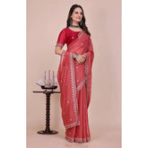 { "alt_text": "Coral red georgette saree with embellishment, unstitched blouse, 5.5 meter ethnic wear for women" }