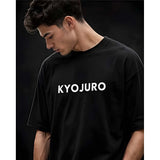 { "alt_text": "Black cotton blend men's oversized t-shirt, printed casual wear, round neck half sleeve, 220 GSM" }