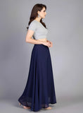 { "alt_text": "Navy blue georgette women's palazzo pants, solid high-rise wide leg flared trousers, ankle length ethnic wear" }