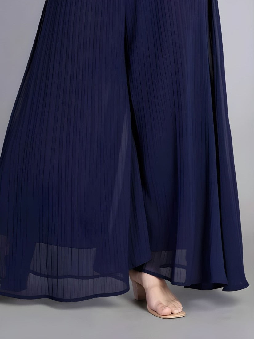 { "alt_text": "Navy blue georgette women's palazzo pants, solid high-rise wide leg flared trousers, ankle length ethnic wear" }