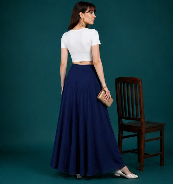 { "alt_text": "Navy blue georgette women's palazzo pants, solid mid-rise wide leg flared pants, ankle length ethnic wear" }