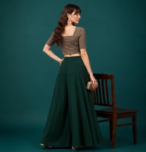 { "alt_text": "Bottle green georgette women's palazzo pants, solid wide leg flared pants, mid-rise ankle length clothing" }