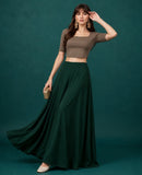 { "alt_text": "Bottle green georgette women's palazzo pants, solid mid-rise wide leg flared pants, ankle length ethnic wear" }