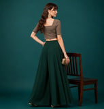 { "alt_text": "Bottle green georgette women's palazzo pants, solid wide leg flared pants, mid-rise ankle length clothing" }