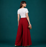 { "alt_text": "Maroon georgette women's palazzo pants, solid wide leg flared pants, mid-rise elastic waist ankle length" }