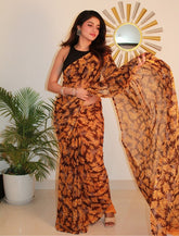 { "alt_text": "Black-yellow georgette printed saree with unstitched blouse, 5.5m, ethnic wear fashion" }