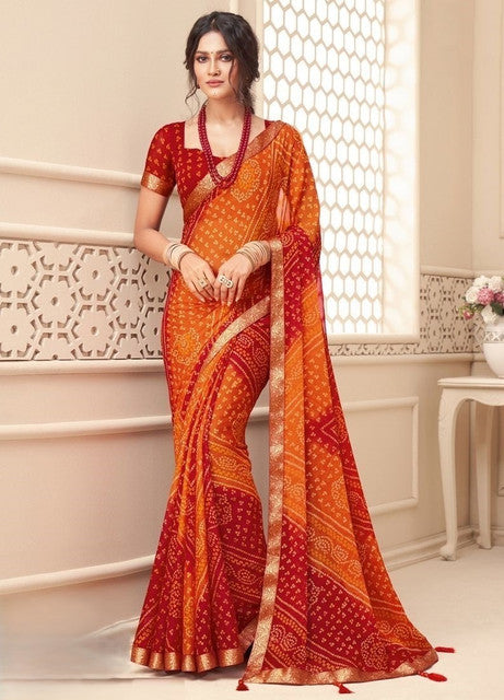 { "alt_text": "Orange-red georgette bandhani printed saree, 5.5Mtr, ethnic wear, Indian fashion, wedding attire" }