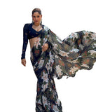{ "alt_text": "Black georgette saree with floral print, 5.5m women's ethnic wear, unstitched blouse for festive occasion" }