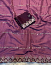 { "alt_text": "Pink georgette embroidered saree with unstitched blouse, 5.5 meter ethnic wear, Indian occasion outfit" }
